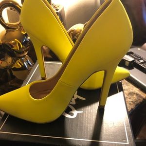 Neon yellow heels